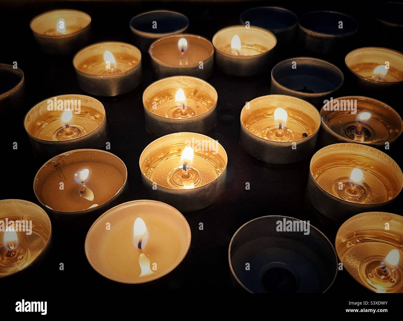 Close up of votive candles in a church - Smartphone Captured Stock Image