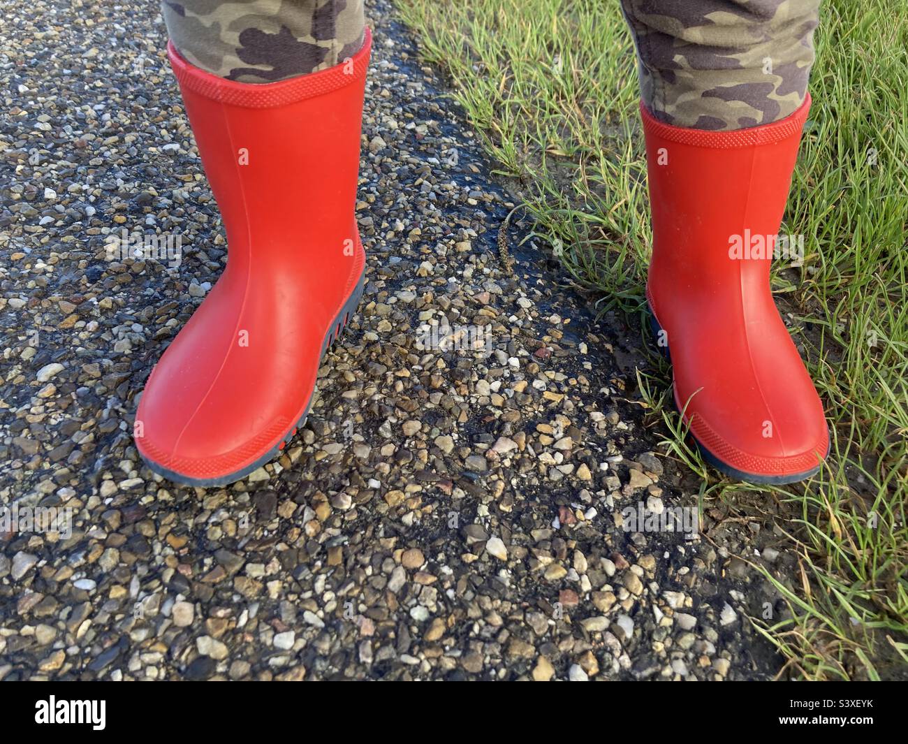 Little red boots Stock Photo - Alamy