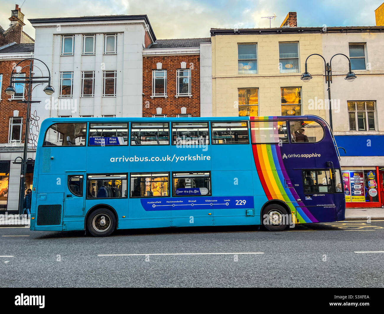 229 Blue double decker bus arriva sapphire on Vicar Lane in Leeds city centre with rainbow pride paint work Stock Photo