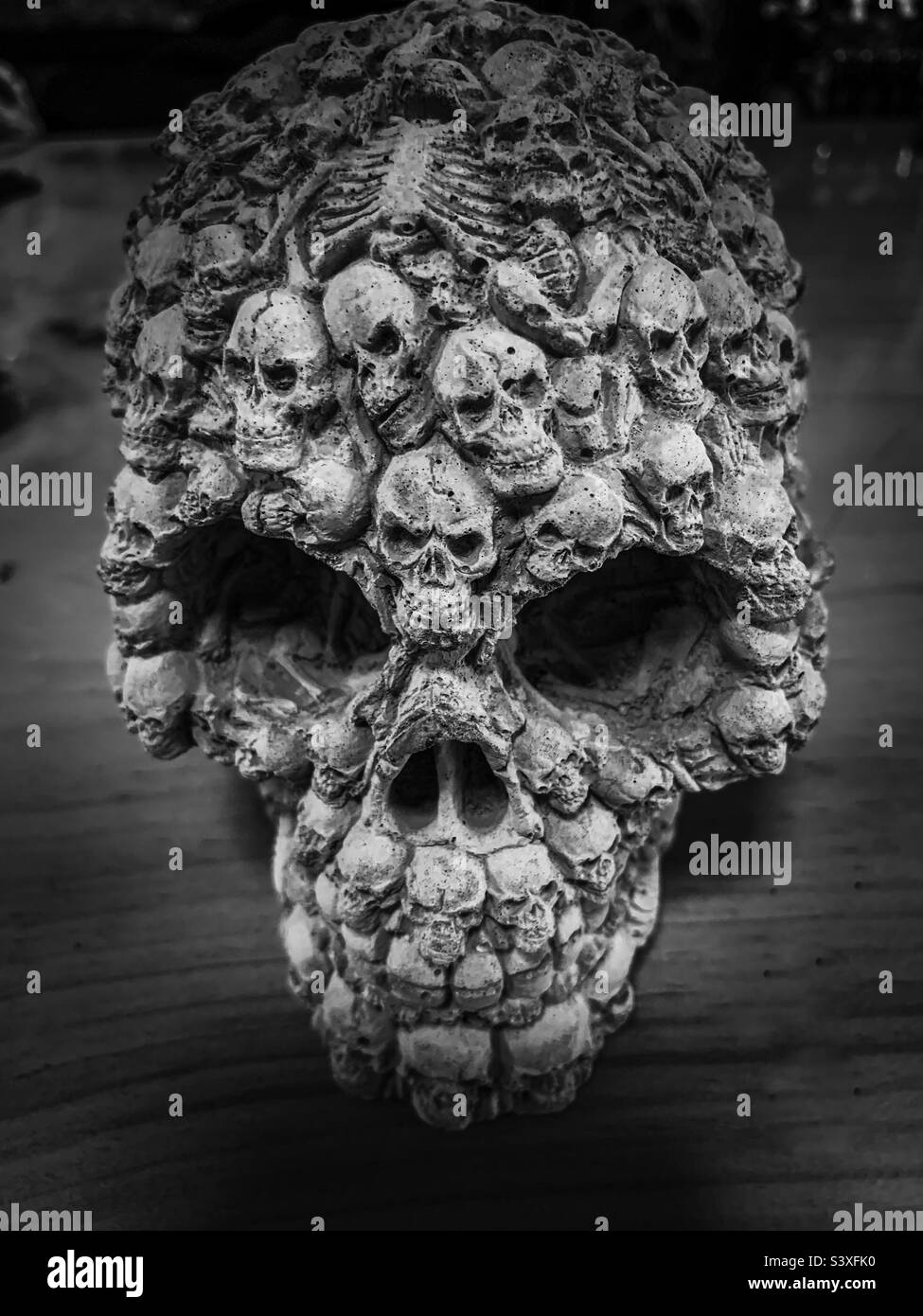 Black and white up close concrete skull statue Stock Photo