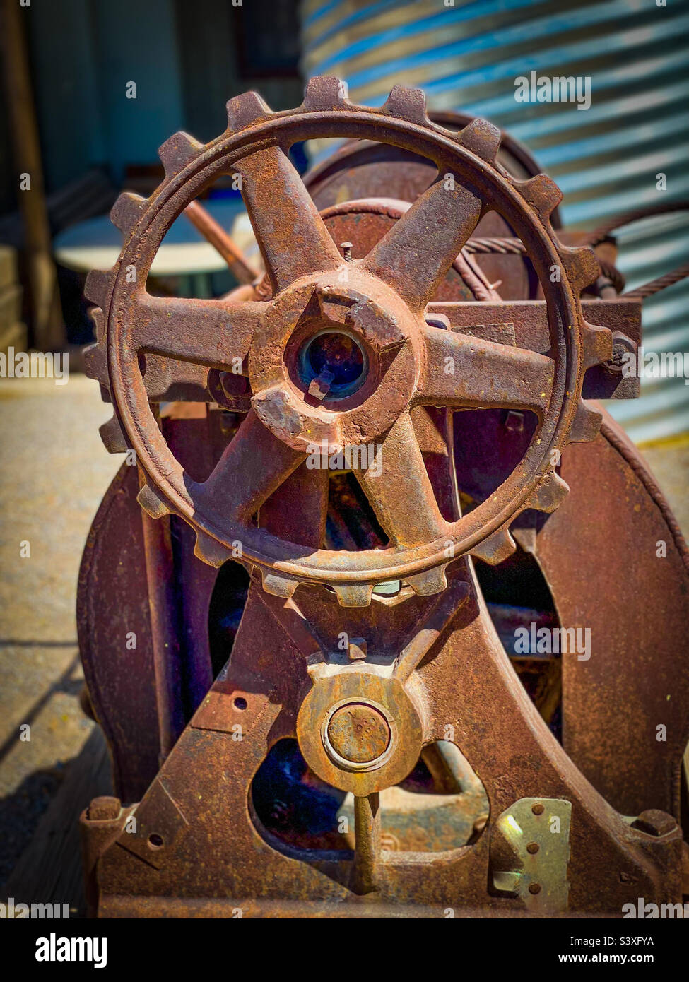 A rusty antique industrial winch. Stock Photo