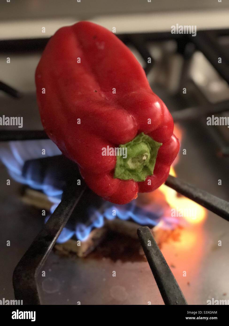 Roasting a Red pepper - Smartphone Captured Stock Image