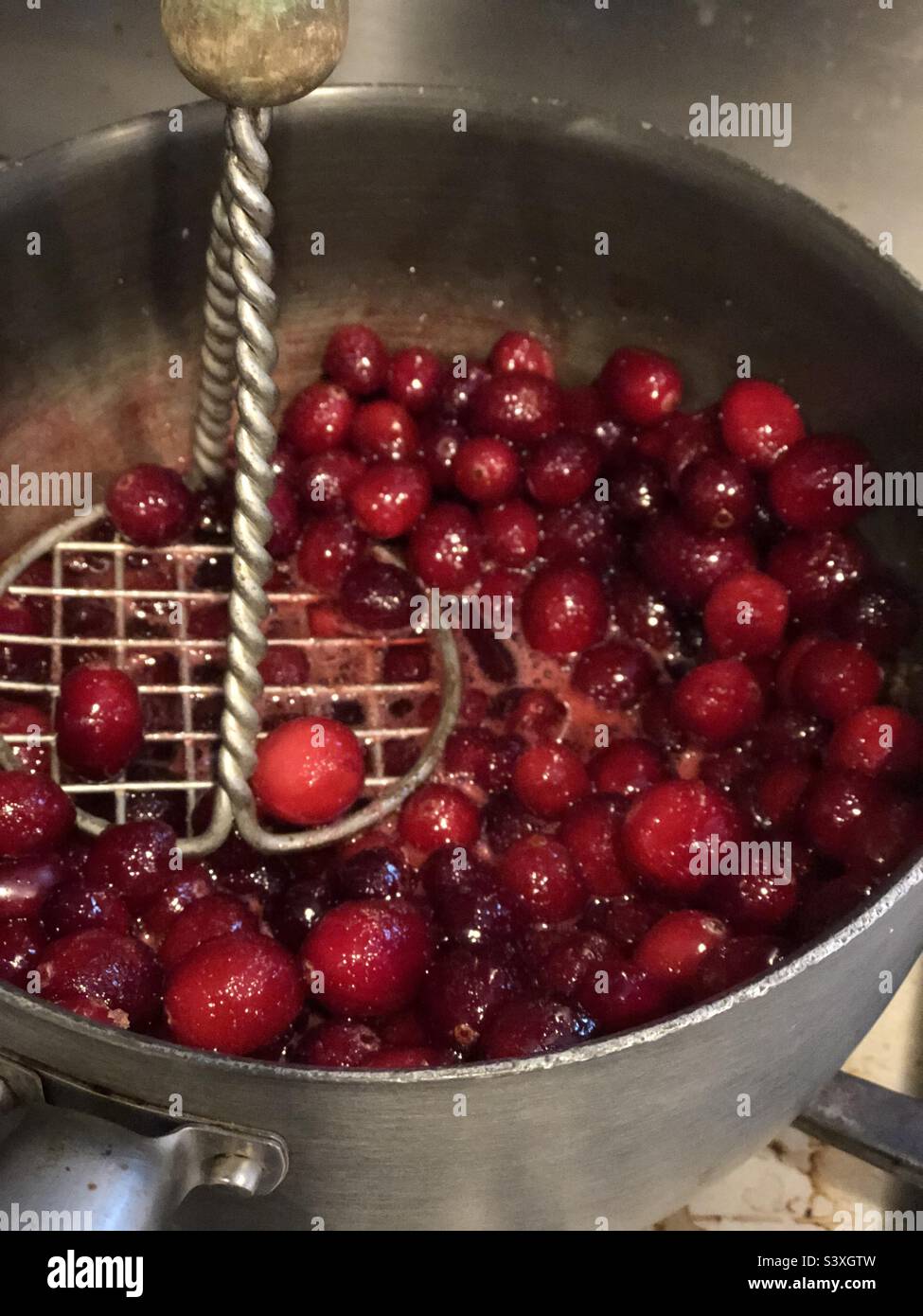 Making cranberry sauce - Smartphone Captured Stock Image