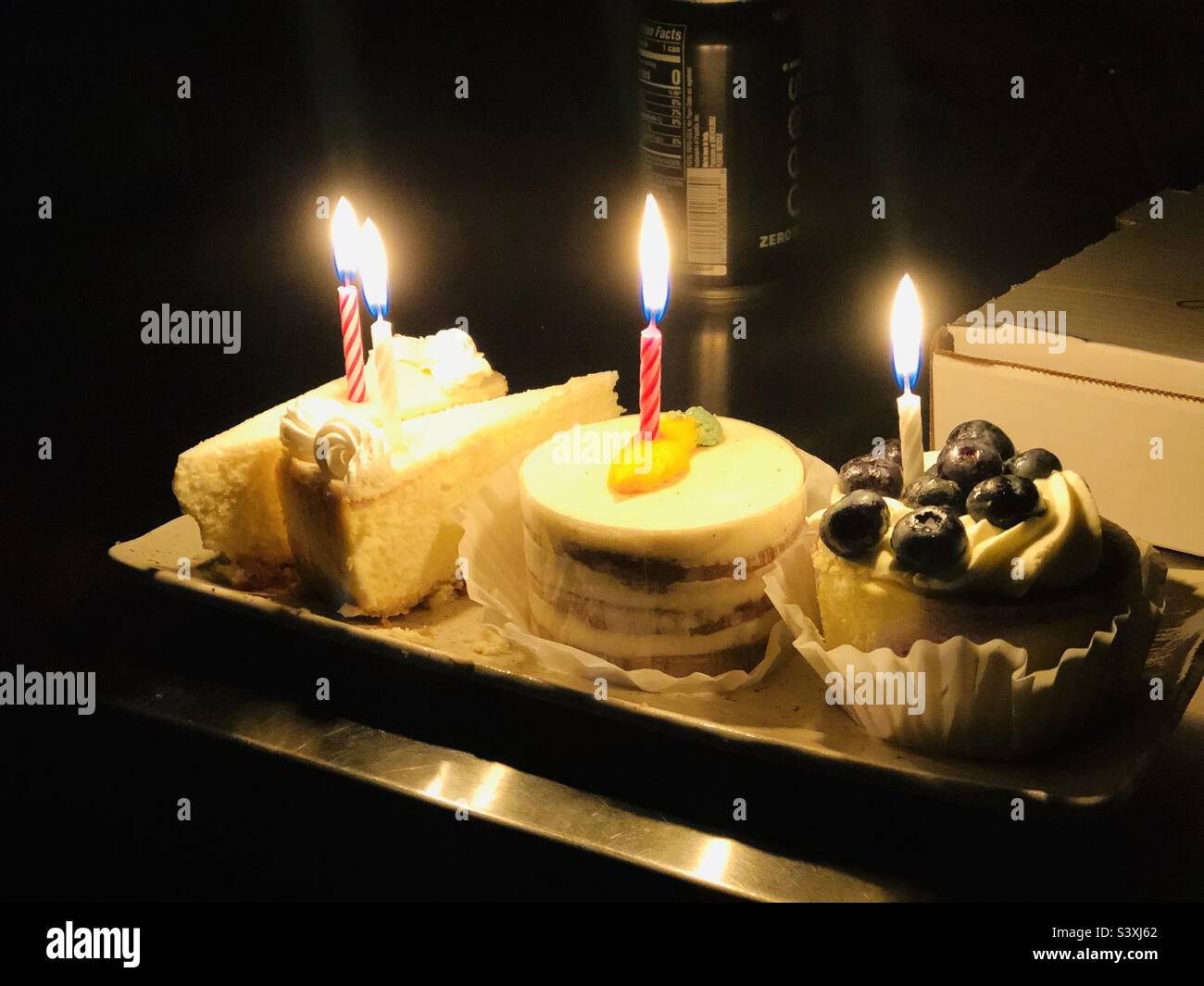 Cakes with candle Stock Photo Alamy