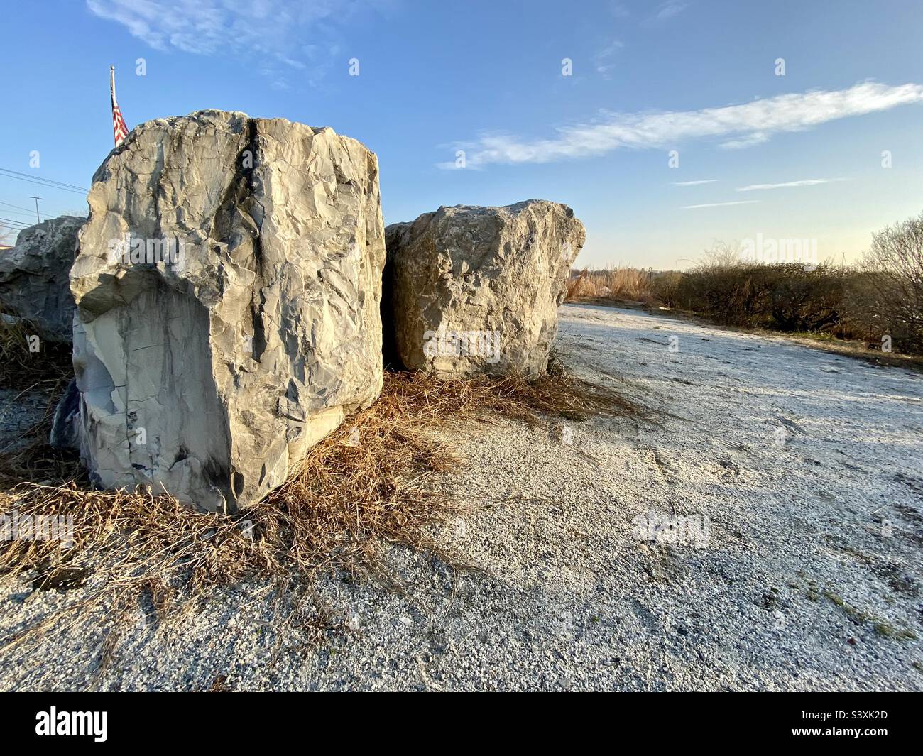 Big stones at a beach with beautiful blue sky, NY - Smartphone Captured Stock Image