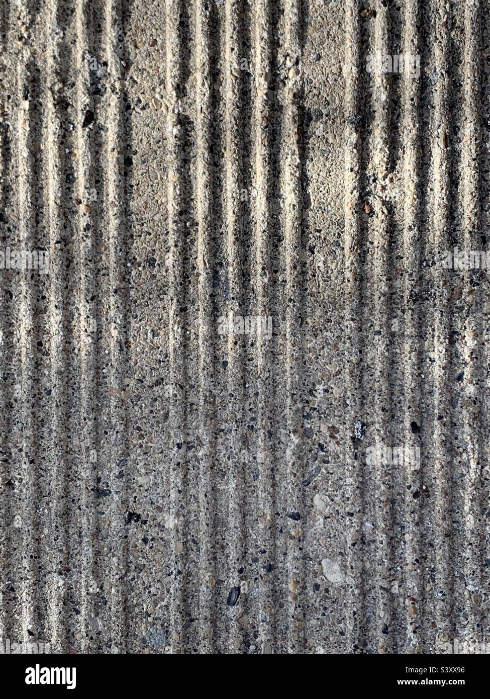 Grooved concrete in sunlight - Smartphone Captured Stock Image