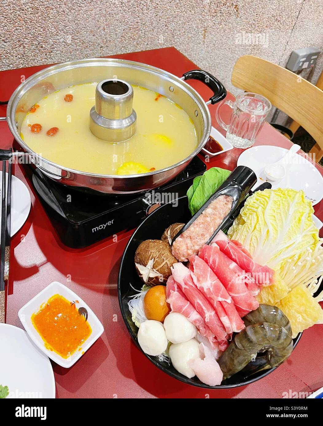 Steamboat time. Chicken collagen soup base, black pork slices, pork