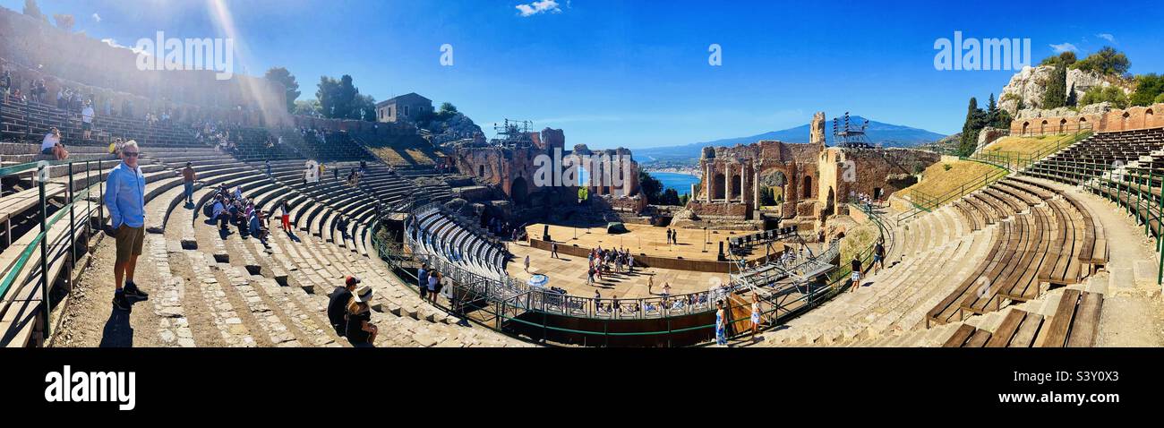Taking in the view from the Roman amphitheatre in Taormina Sicily - Smartphone Captured Stock Image