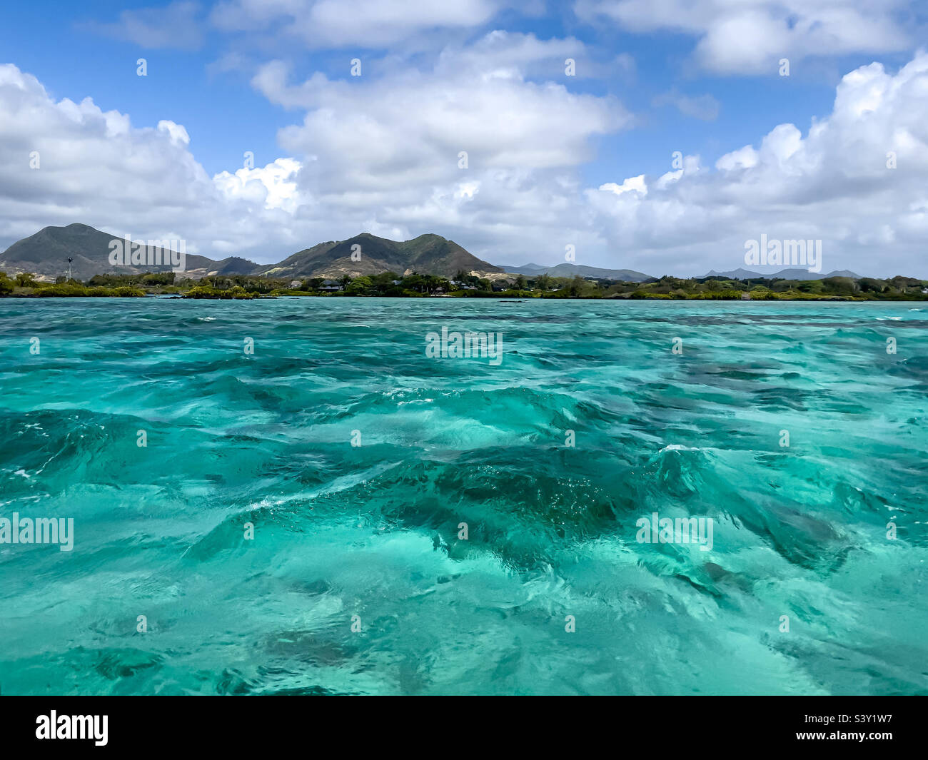 Indian Ocean turquoise water of Ile aux Cerfs, Mauritius - Smartphone Captured Stock Image