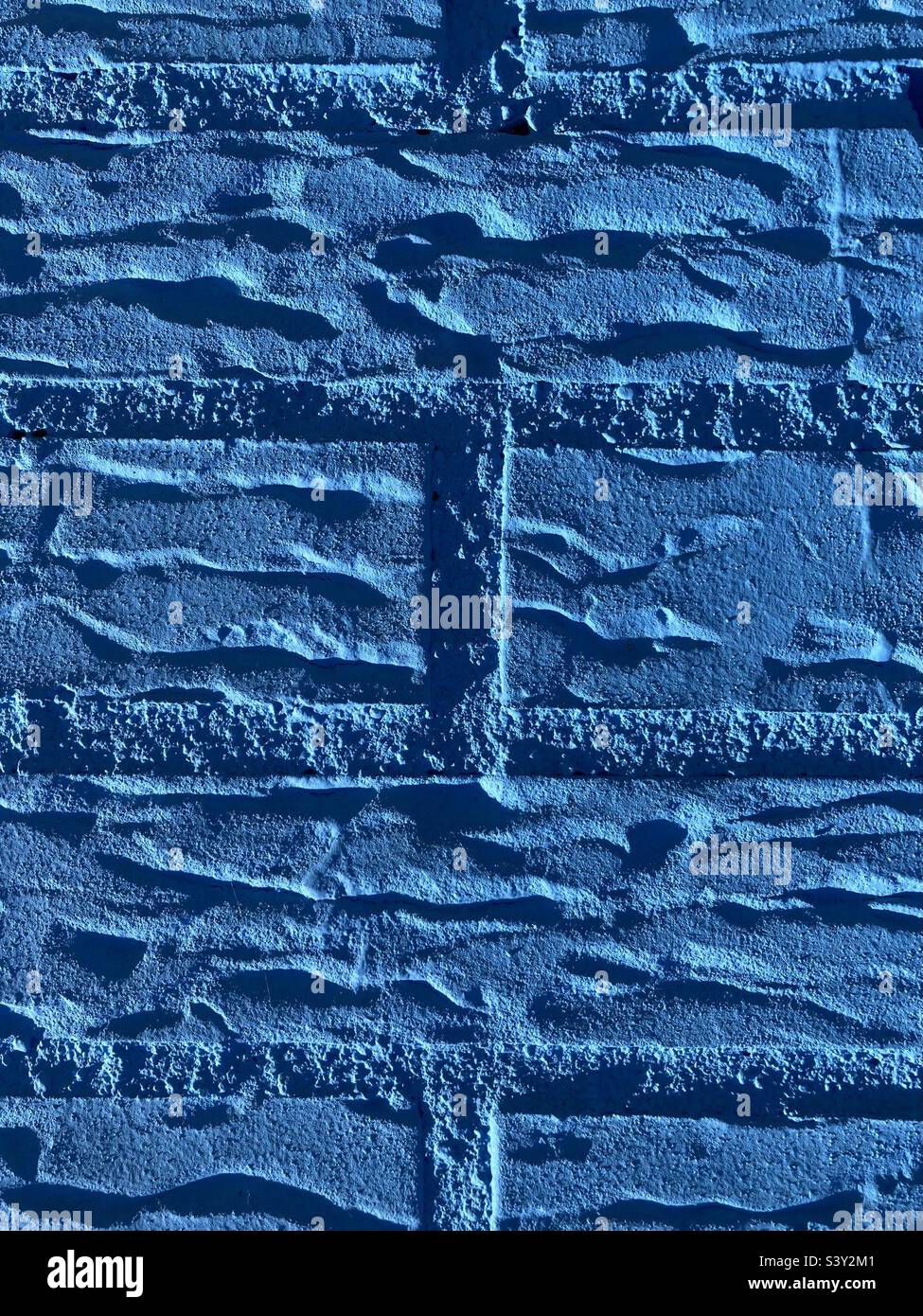 A bright blue painted wall - Smartphone Captured Stock Image