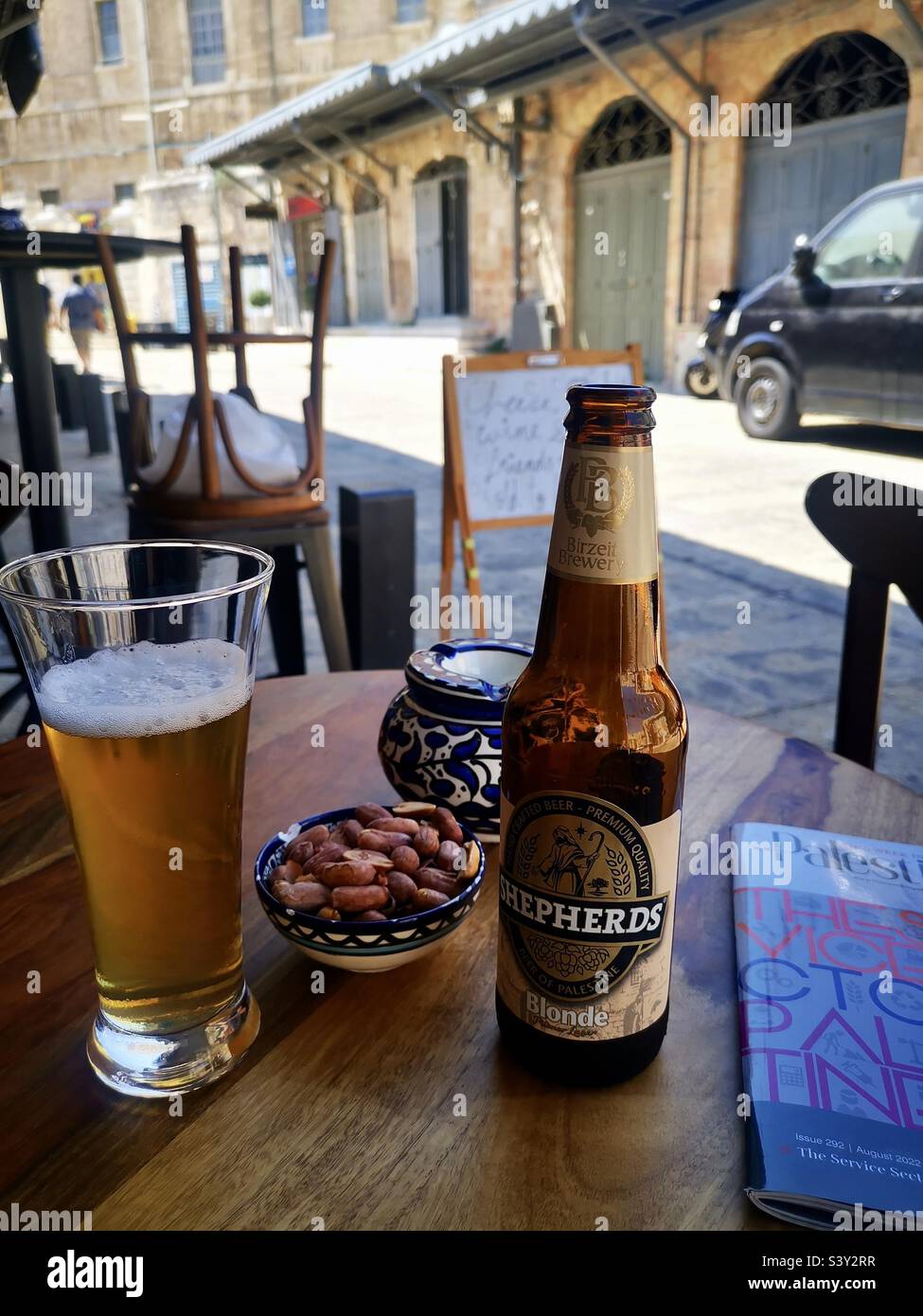 Enjoying a bottle of Shepherds Palestinian beer by the New Gate, old