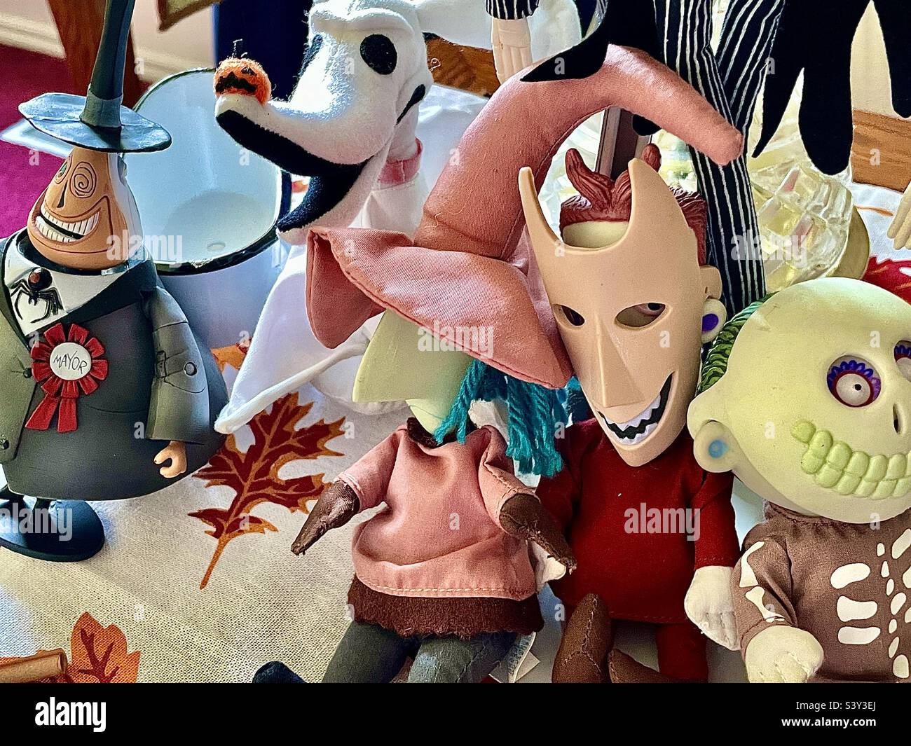 Nightmare Before Christmas dolls and figurines set upon an end table serve as Halloween decorations each year in a Utah, USA home. - Smartphone Captured Stock Image