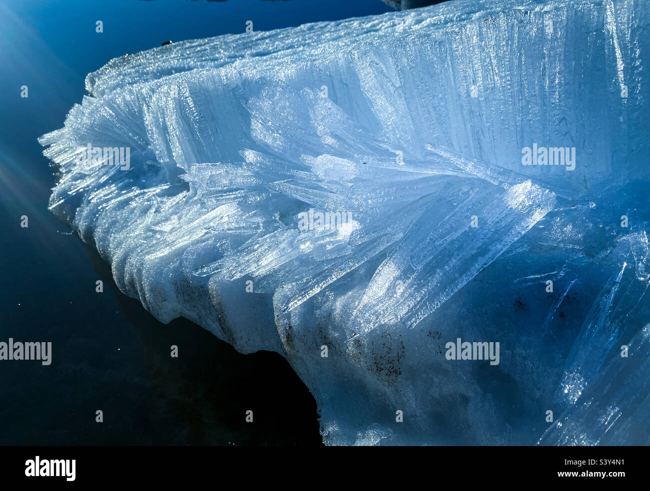 Ice crystals breaking off a beached floe during the arctic spring melt in Kotzebue Sound, Kotzebue, Alaska Stock Photo