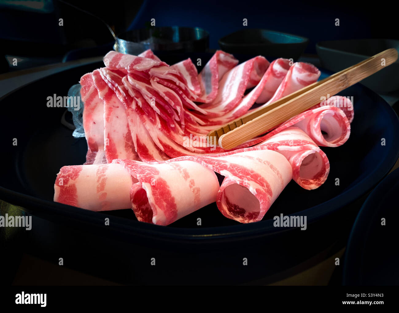 Strips of fresh bacon/sukiyaki sliced pork - Smartphone Captured Stock Image