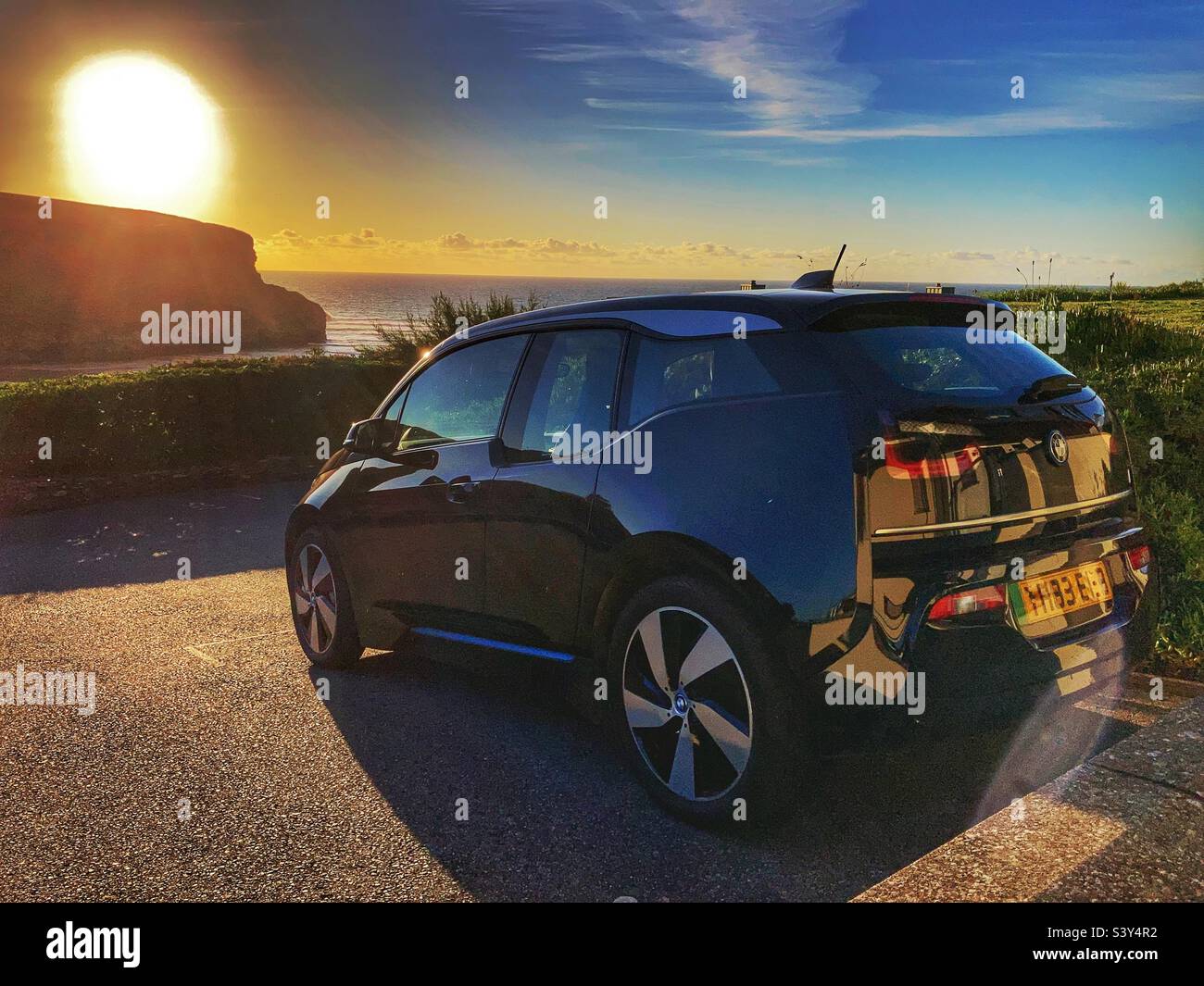 BMW i3 electric car at sunset Mawgan Porth North Cornwall - Smartphone Captured Stock Image