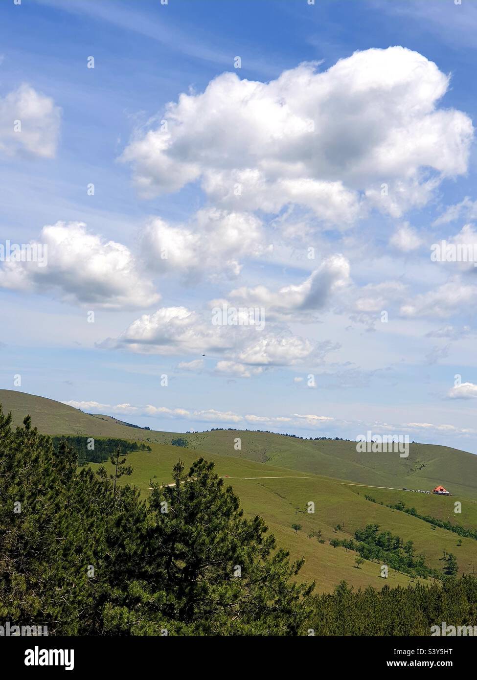A lonely village house in the mountains.  Is this an anti-stress drug? Stock Photo