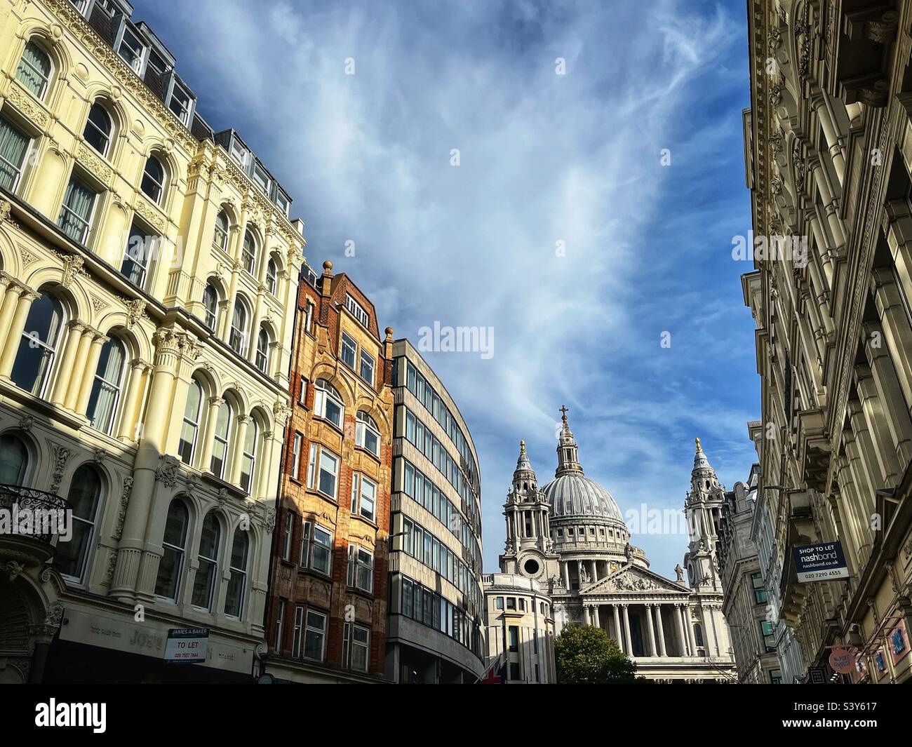 A view along Ludgate Hill toward St. Paul’s Cathedral in central London, England. Stock Photo