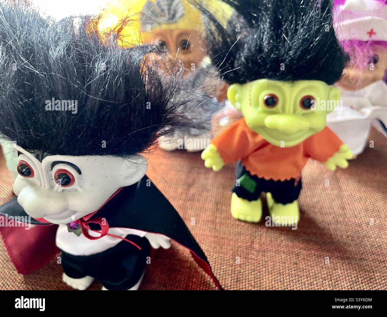 My wife has a collection, gathered over the years as she could find them, of cute, costumed trolls that she puts on display in our home each October for Halloween. - Smartphone Captured Stock Image