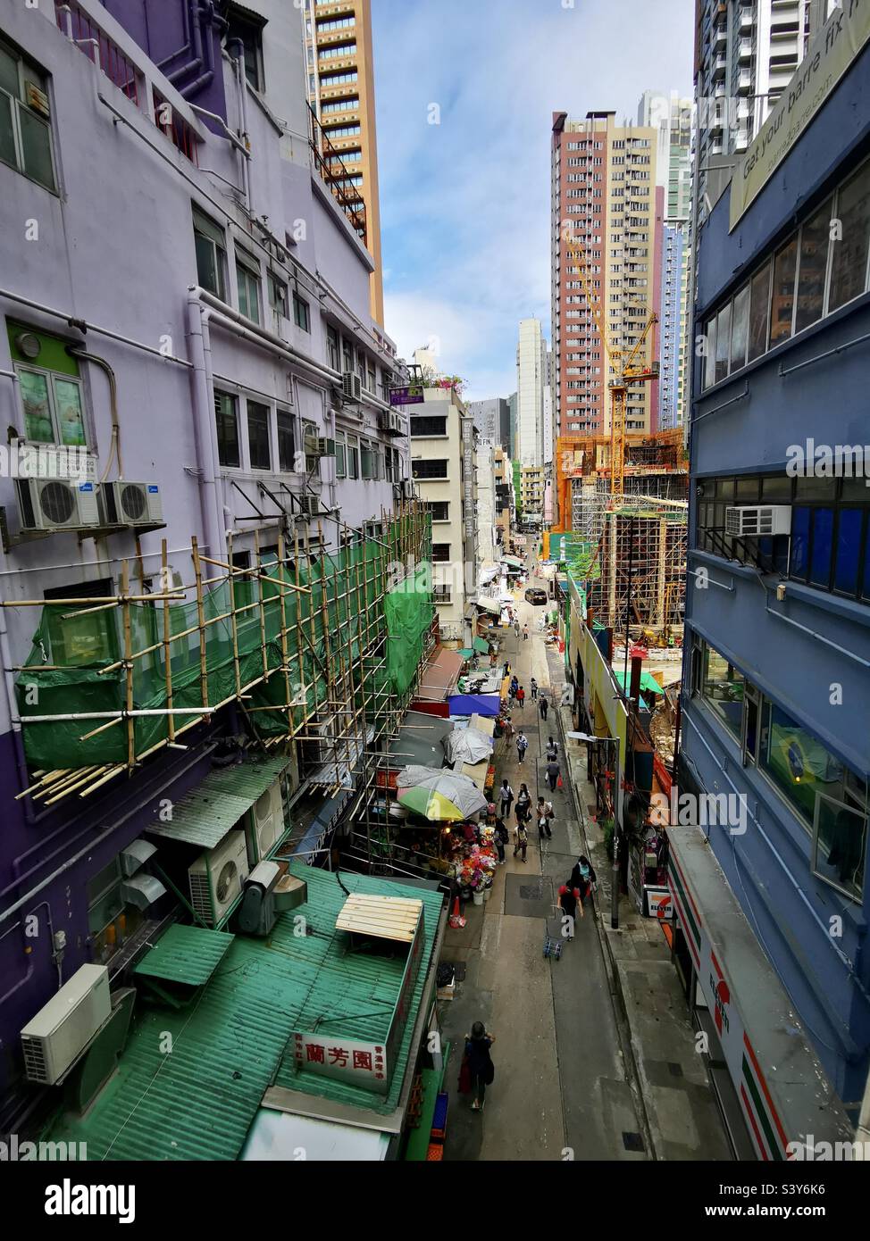 The vibrant Gage street with new construction site in Hong Kong Stock