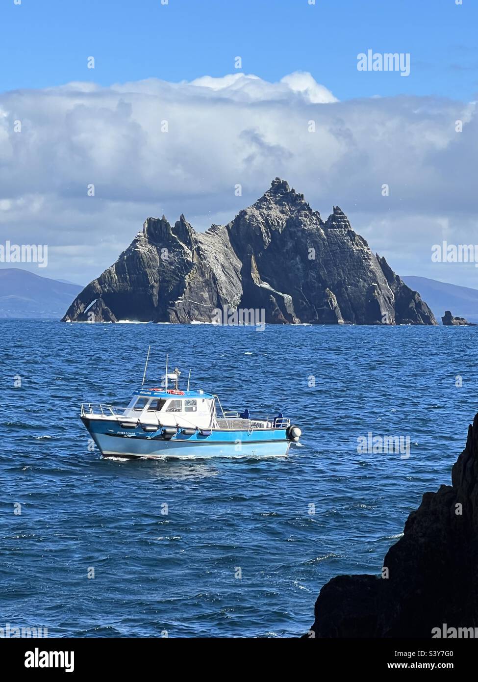View of Little Skellig from Skellig Michael in Ireland with small boat Stock Photo