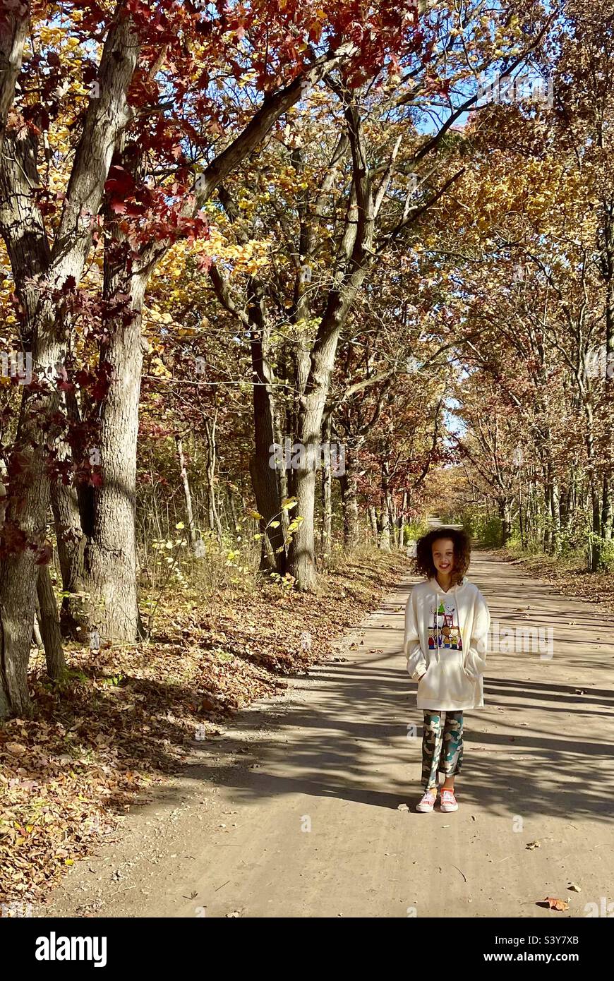 Girl on Michigan dirt road - Smartphone Captured Stock Image