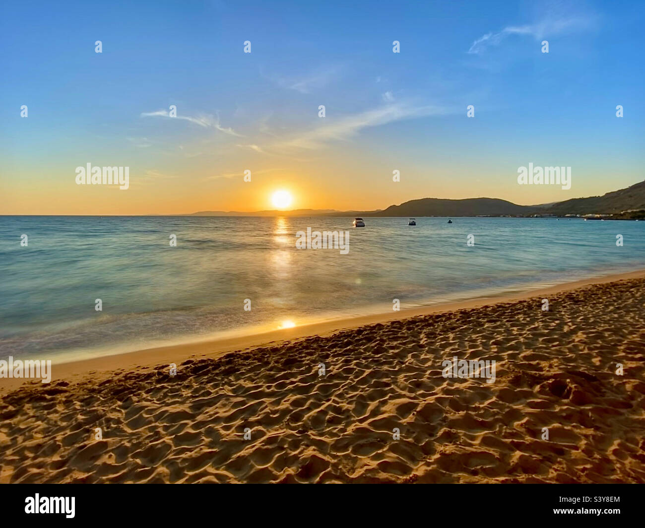 Sunset over Lardos Bay from Pefkos on Rhodes , Greece. Stock Photo