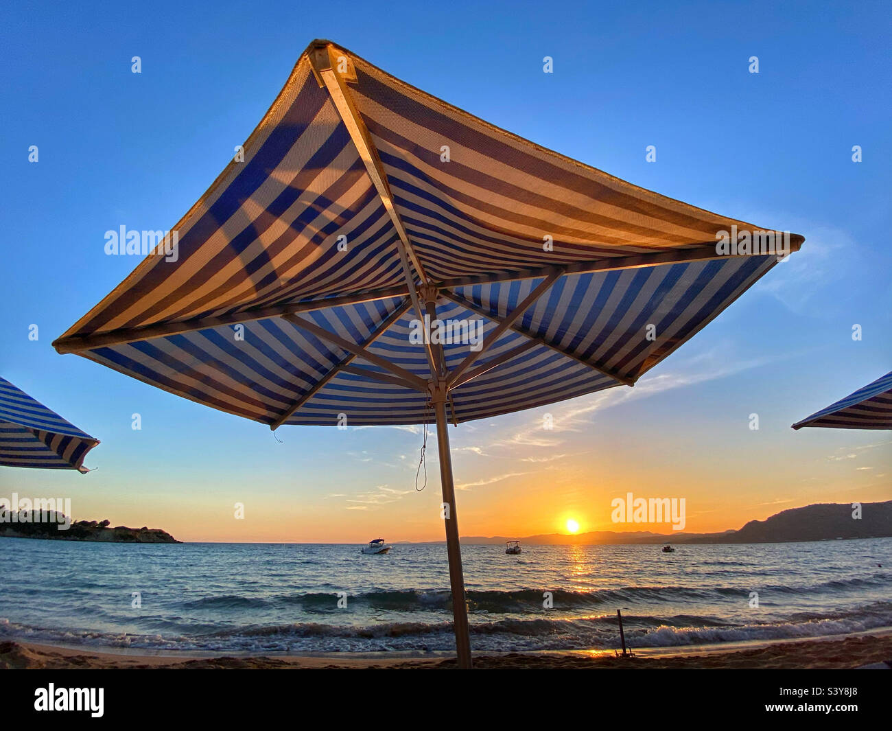 Sunset over Lardos Bay and beach at Pefkos on island of Rhodes, Greece Stock Photo