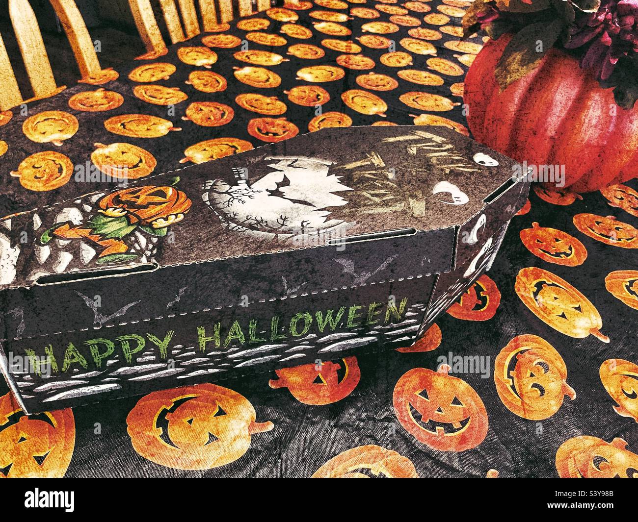 A coffin shaped box of candy given to employees of a local business just in time for Halloween, apparently as a seasonal show of appreciation. - Smartphone Captured Stock Image