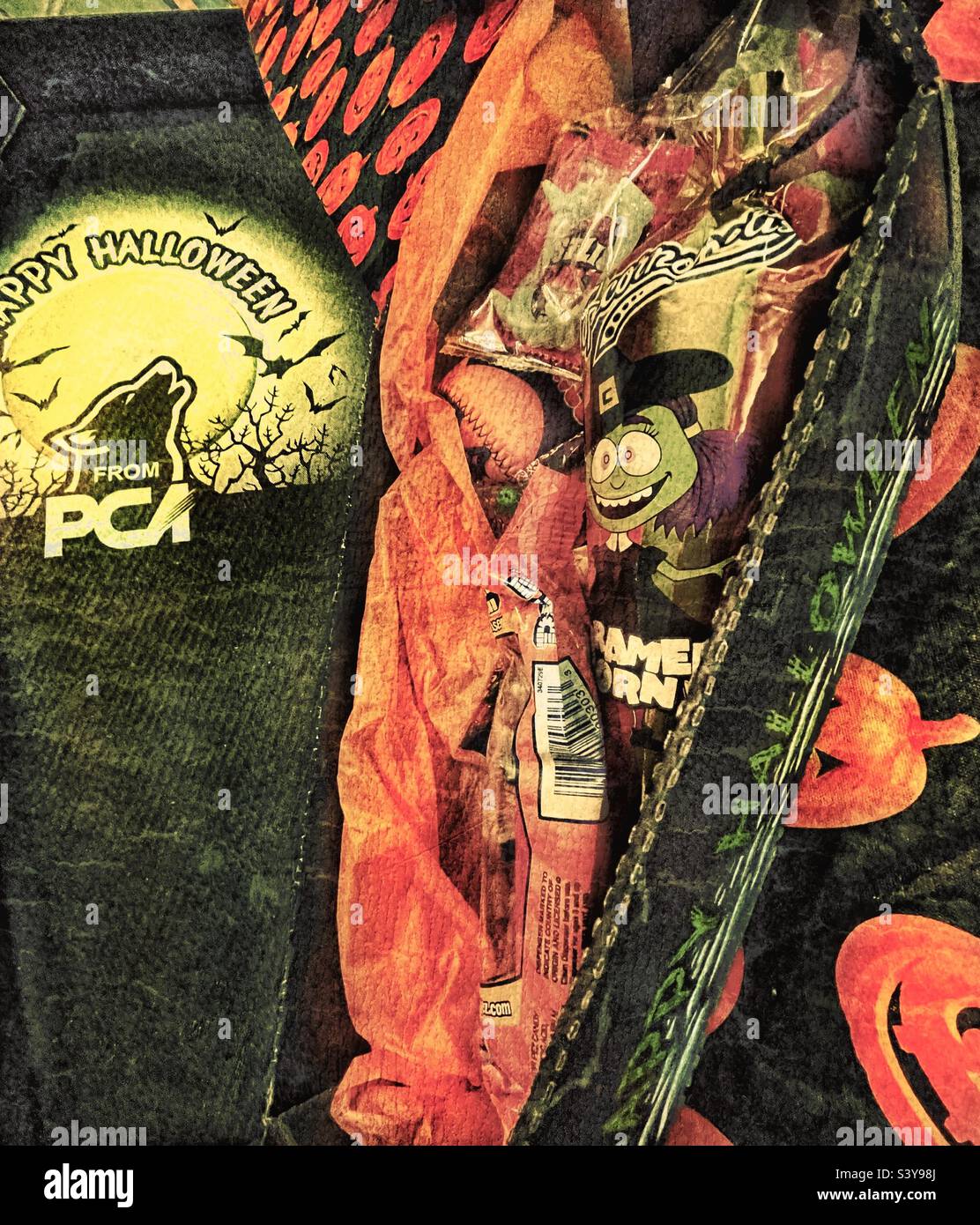 A coffin shaped box of candy given to employees of a local business just in time for Halloween, apparently as a seasonal show of appreciation. - Smartphone Captured Stock Image