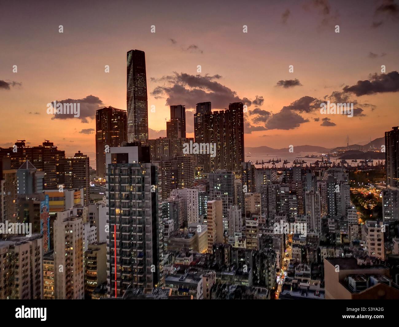 A view of Kowloon and the ICC tower during sunset. - Smartphone Captured Stock Image