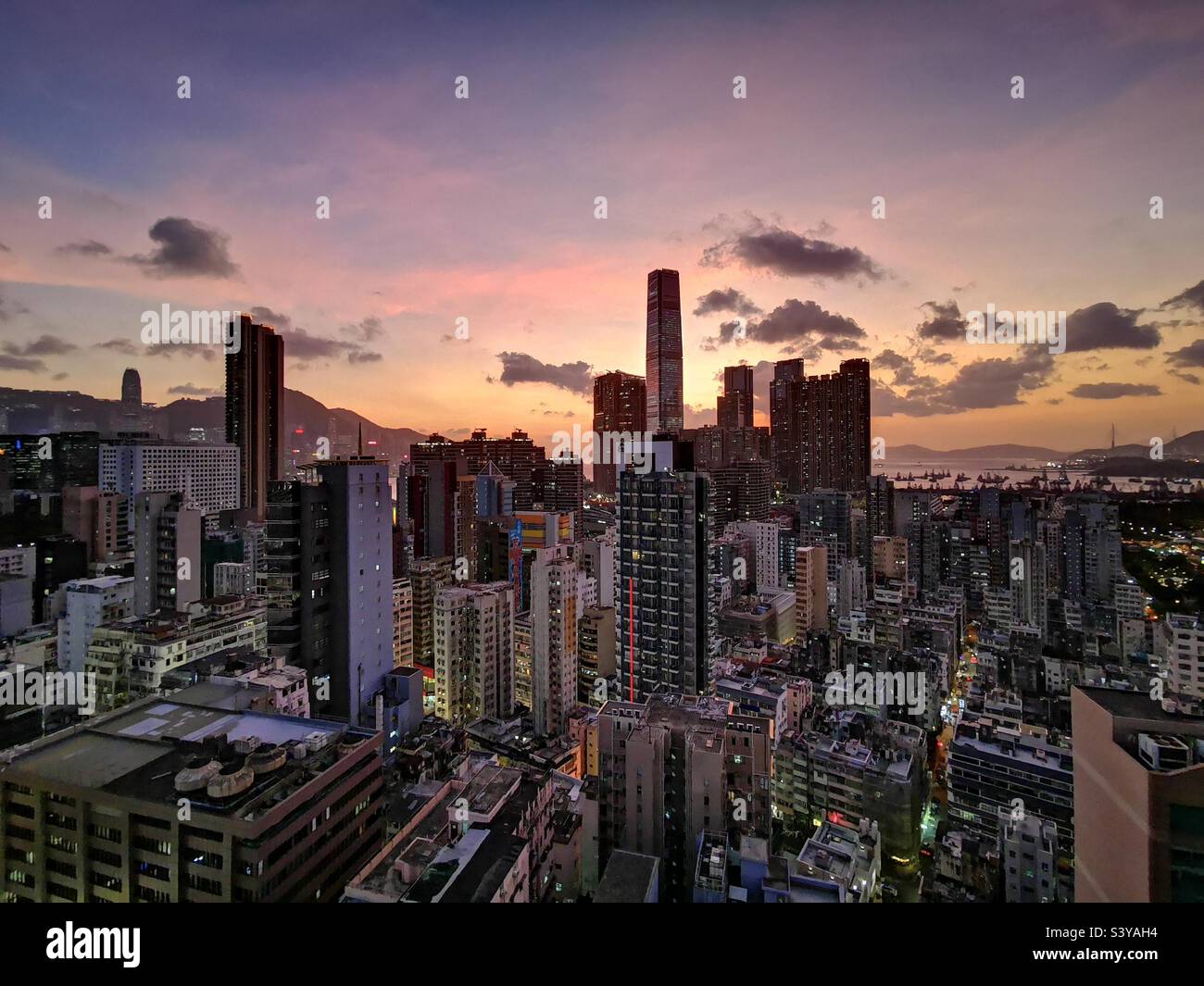 Sunset over the ICC tower and Jordan neighborhood in Kowloon, Hong Kong. - Smartphone Captured Stock Image