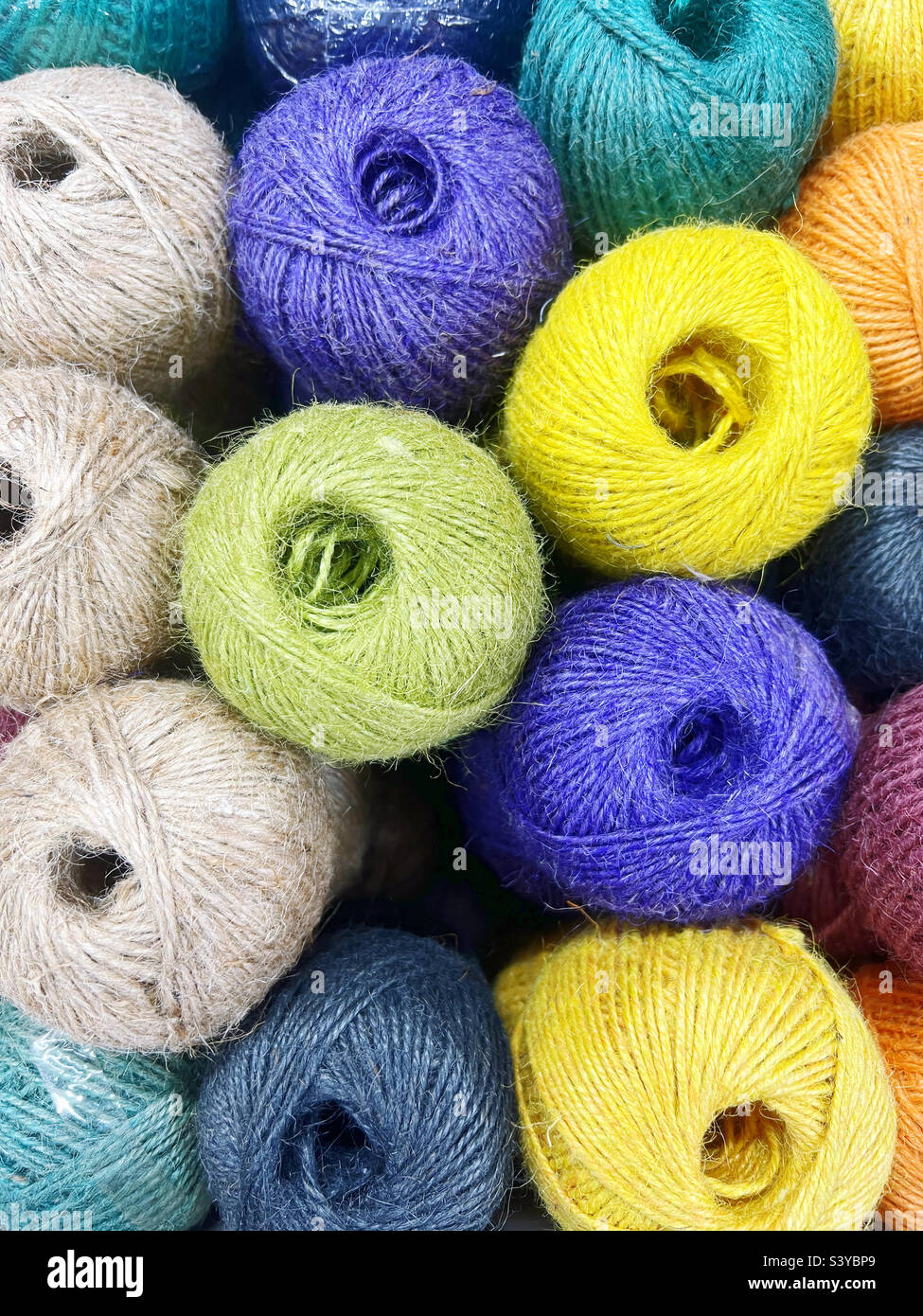 colorful yarn balls as a background Stock Photo Alamy