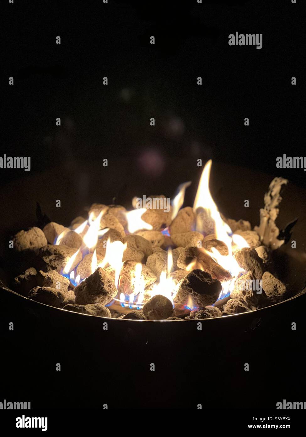 Fire pit lit and burning nighttime Stock Photo Alamy