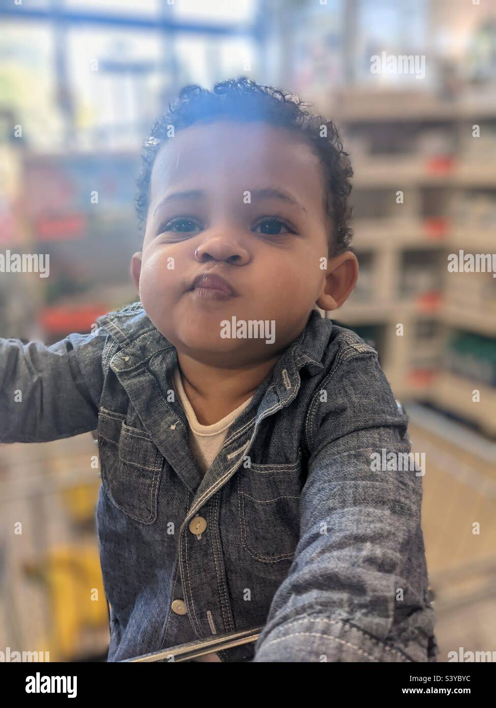 6 month old baby blowing raspberries