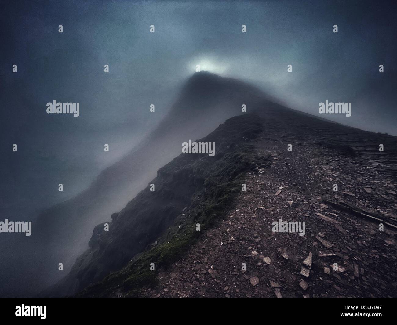 The sun peering through the mist on Pen y Fan, Brecon Beacons, late October. - Smartphone Captured Stock Image