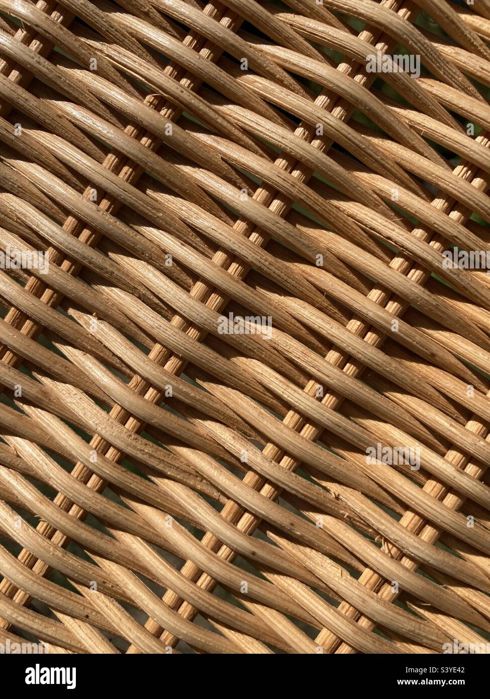 a beige braided rattan pattern - Smartphone Captured Stock Image