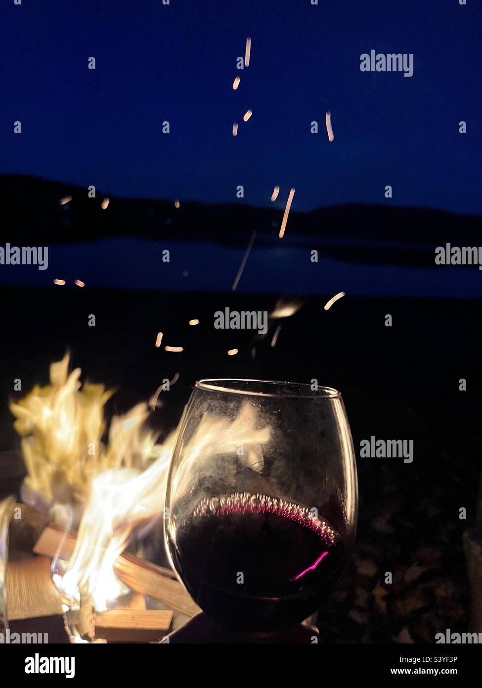 Cozy fireplace with wine Stock Photo Alamy