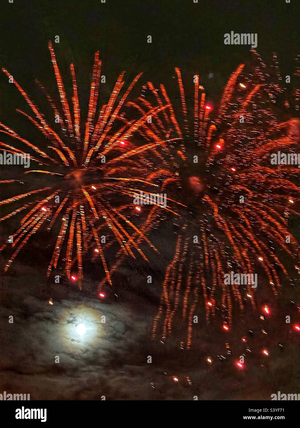 Fireworks and moon Stock Photo Alamy
