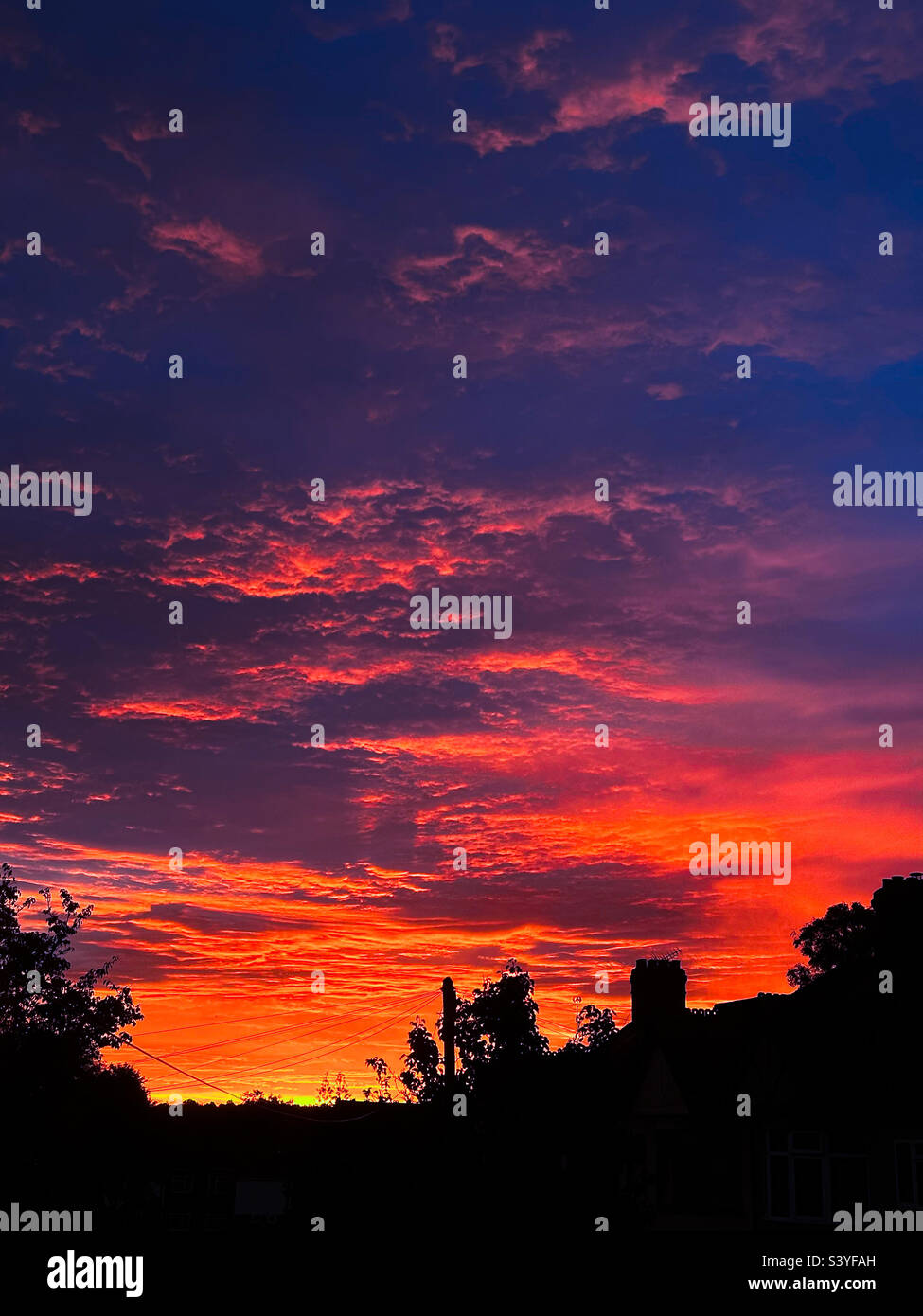Beautiful autumnal orange sky at dawn - Smartphone Captured Stock Image