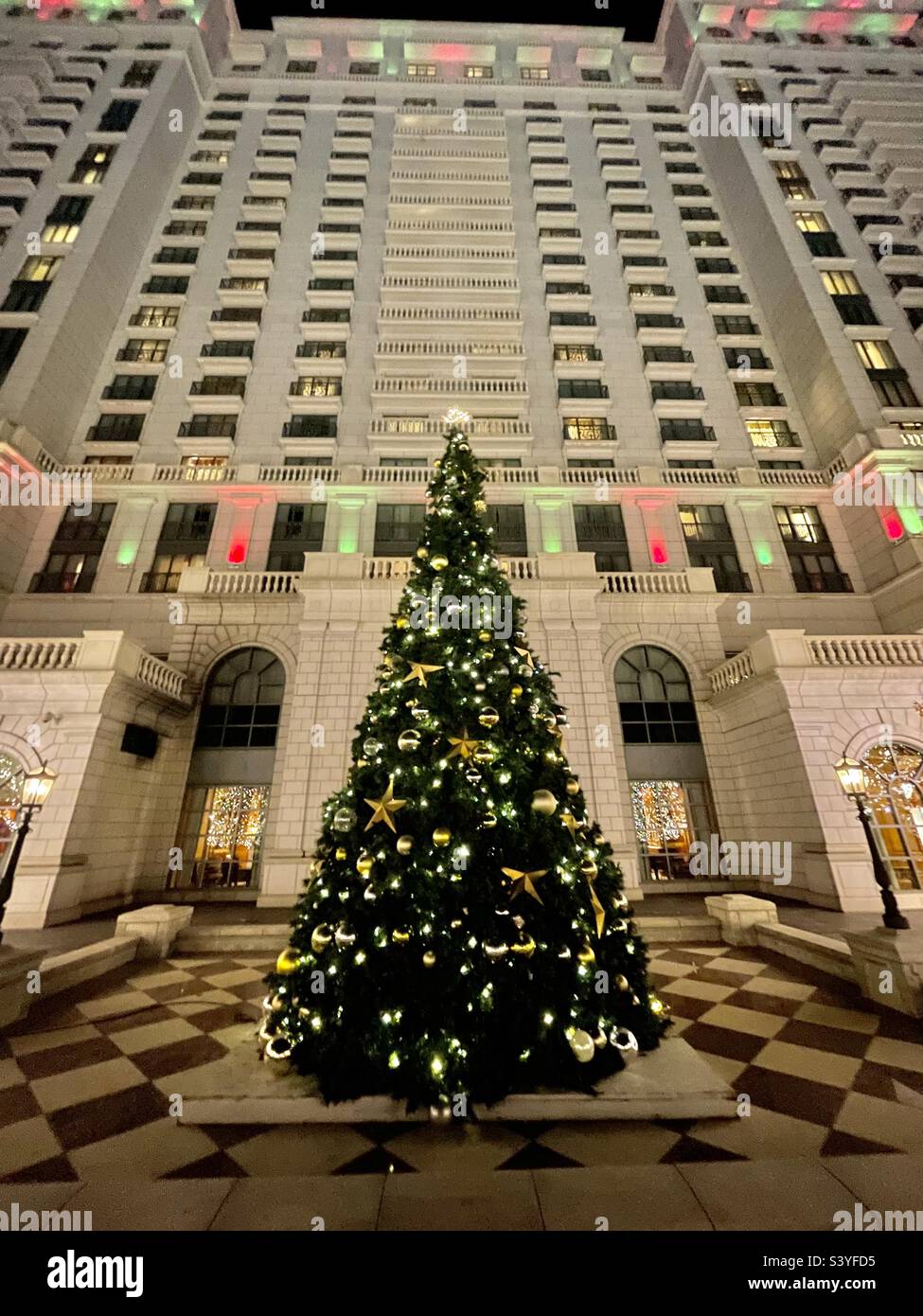 Grand America 5-star hotel in downtown Salt Lake City, Utah, USA decorated and lighted for the Christmas season. - Smartphone Captured Stock Image