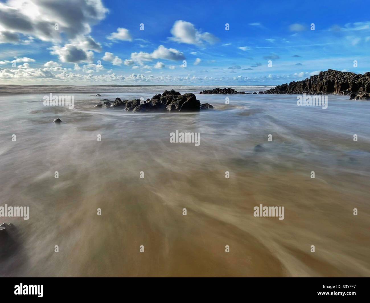 Mewslade beach, Gower, Swansea, Wales. Incoming tide. Stock Photo