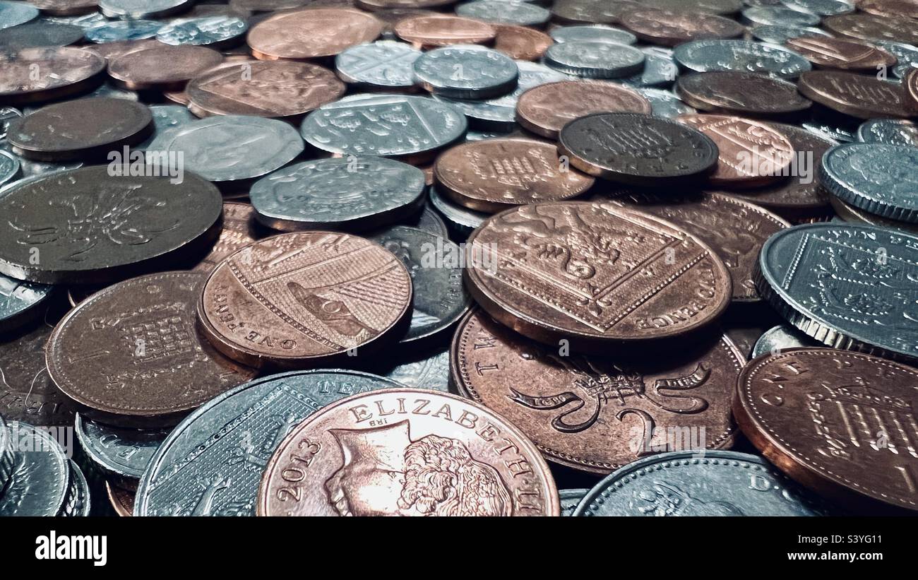 Random heap of small denomination bronze and silver coins - Smartphone Captured Stock Image