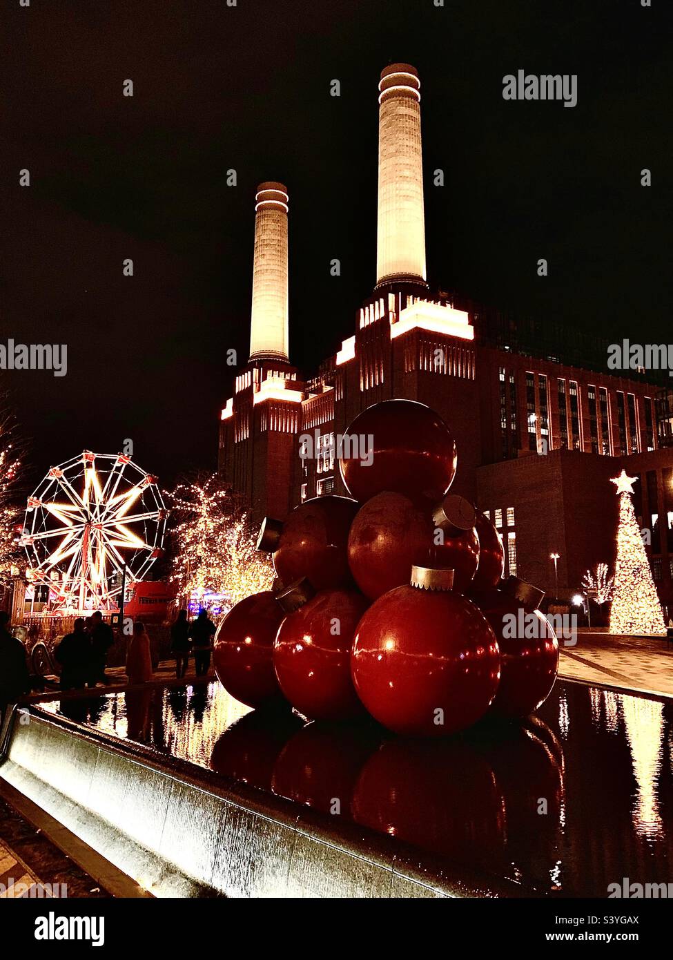 Battersea power station at night during Christmas with decorations, London, England Stock Photo