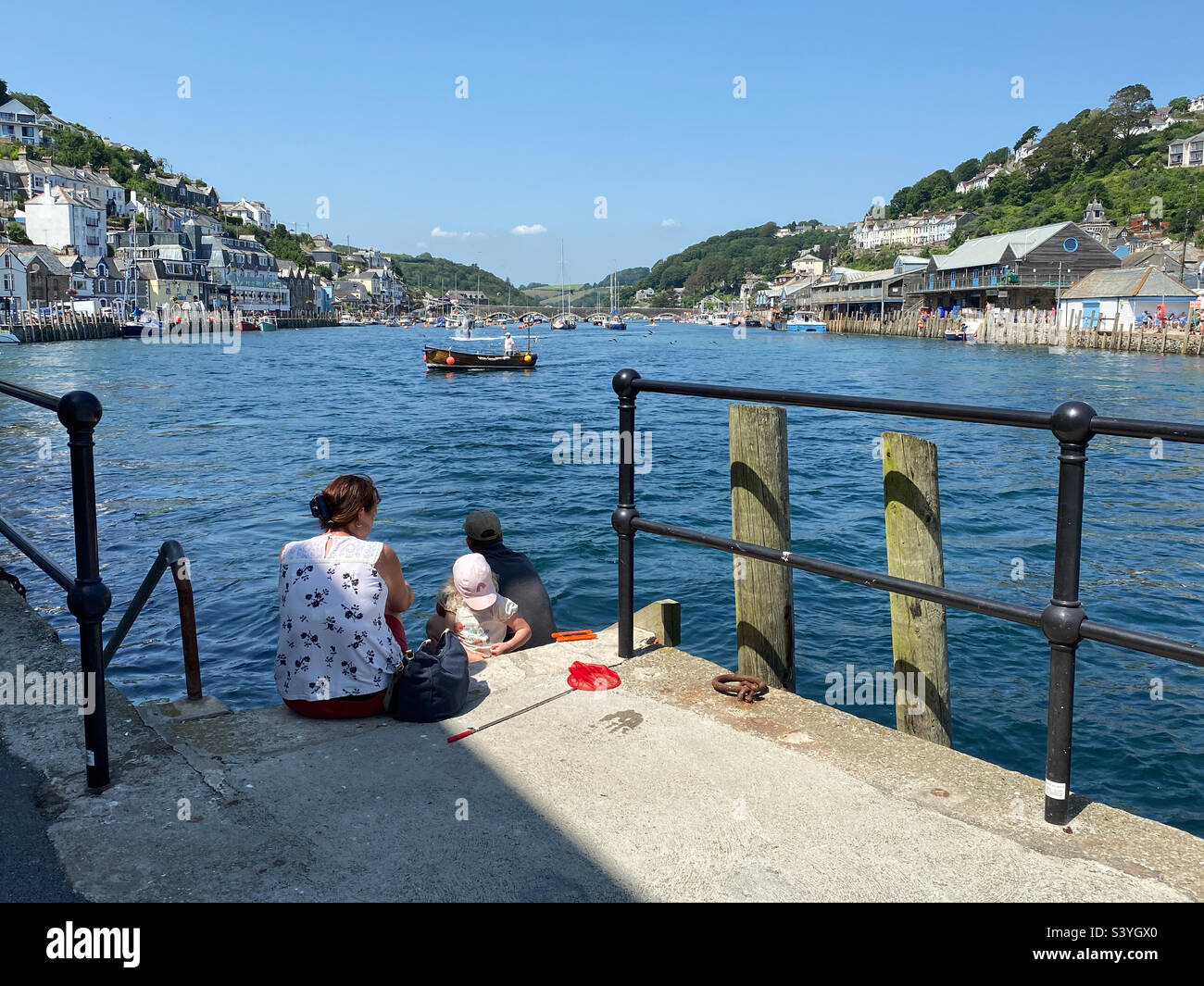 Boating activity on the River Looe in summer sunshine, Cornwall, UK - Smartphone Captured Stock Image