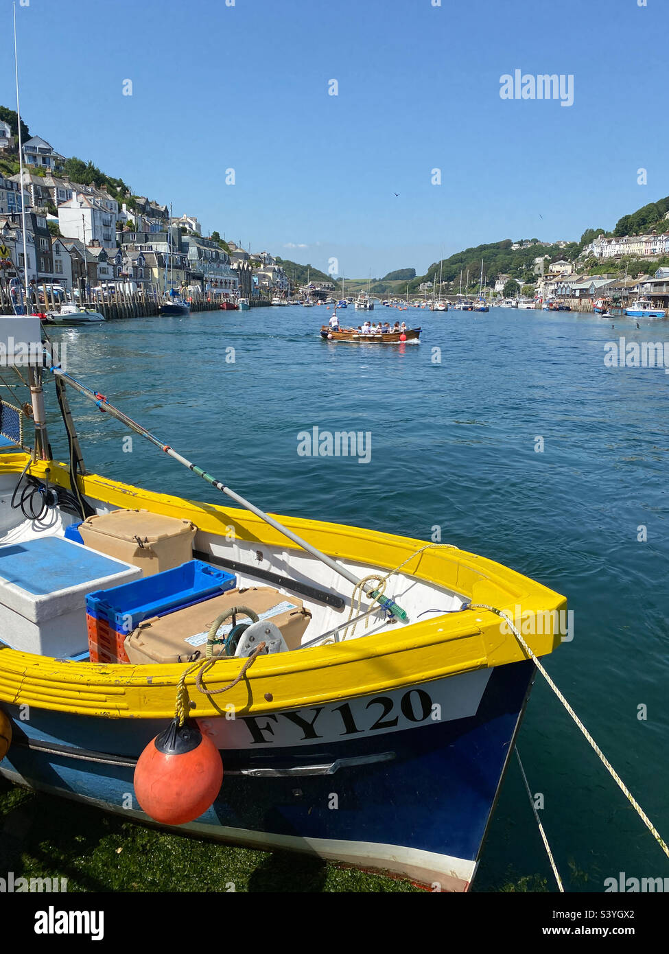 Boating activity on the River Looe in summer sunshine, Cornwall, UK - Smartphone Captured Stock Image
