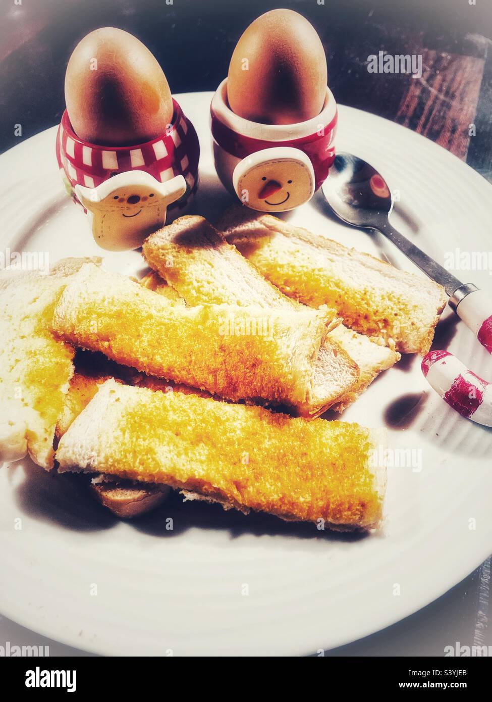 Festive Breakfast dippy egg and soldiers. Christmas egg cup holders