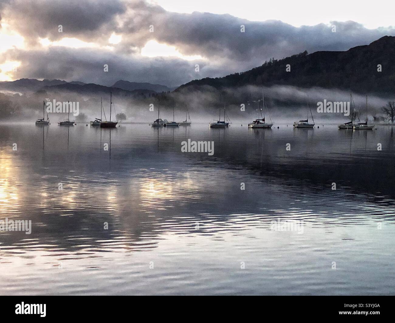 Boats On Lake Windermere At Dusk Cumbria Lake District Stock Photo Alamy boats-on-lake-windermere-at-dusk-cumbria-lake-district-stock-photo-alamy
