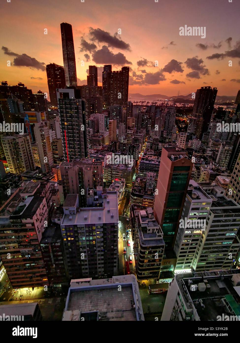 Old & new. Modern skyline with the older residential building of Jordan, Hong Kong. - Smartphone Captured Stock Image