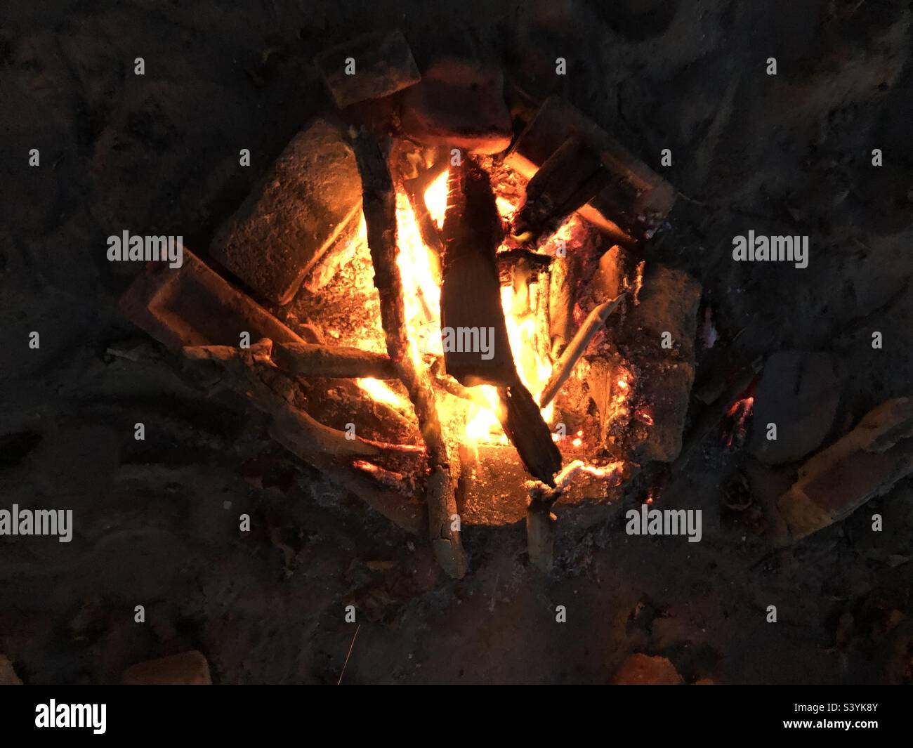 An outdoor fire pit. - Smartphone Captured Stock Image