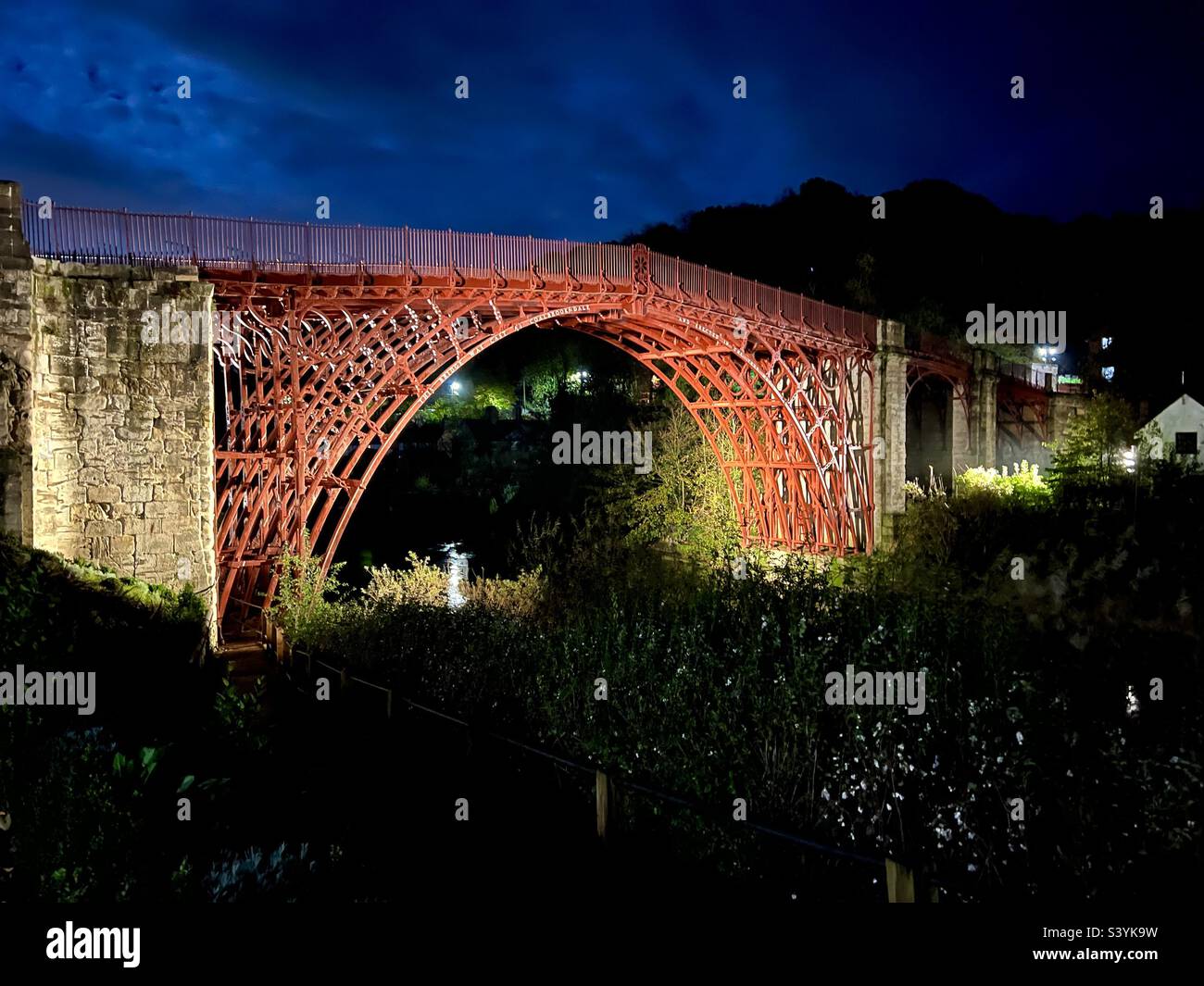 The historic Iron Bridge over the River Severn at Ironbridge, Shropshire. The first cast iron bridge in the world. Designed by Thomas Farnolls Pritchard and built by Abraham Darby - Smartphone Captured Stock Image The historic Iron Bridge over the River Severn at Ironbridge, Shropshire. The first cast iron bridge in the world. Designed by Thomas Farnolls Pritchard and built by Abraham Darby - Smartphone Captured Stock Image